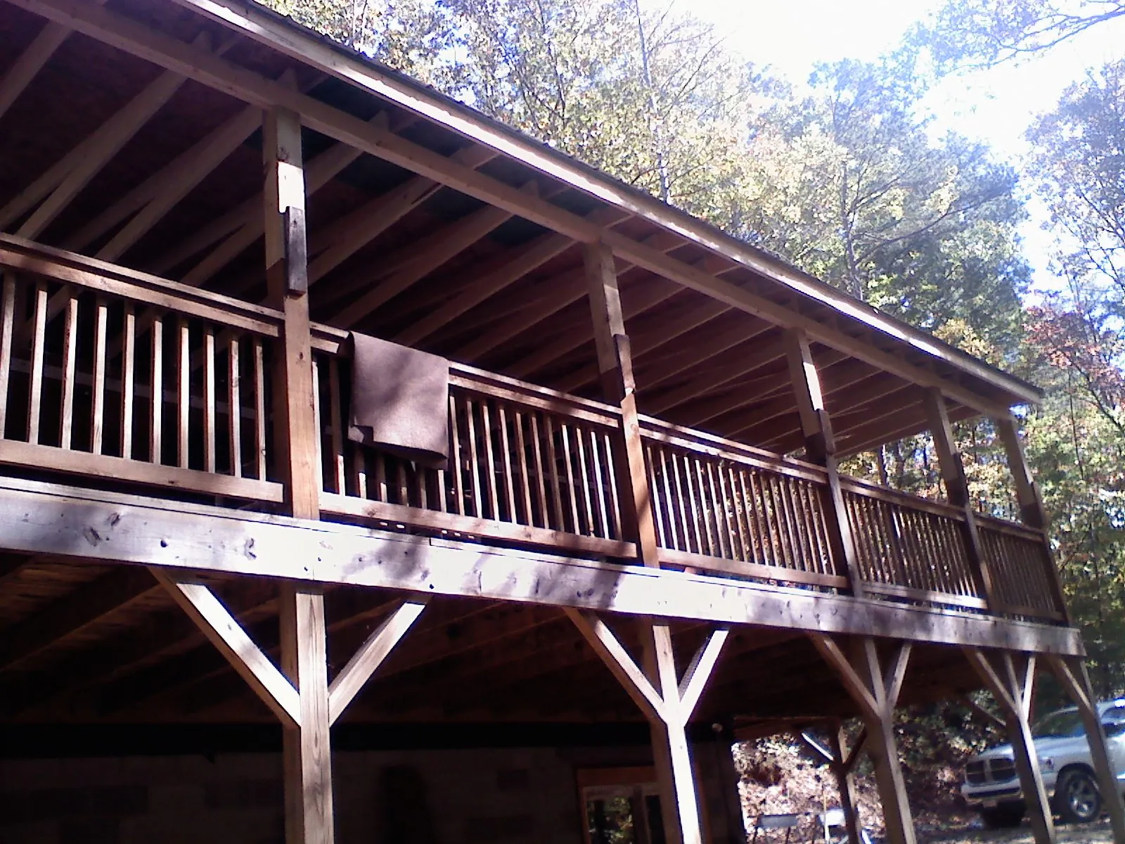 Timber framing under a new elevated porch and deck — Roof Leak Repair in Skillman by Roofing Brothers